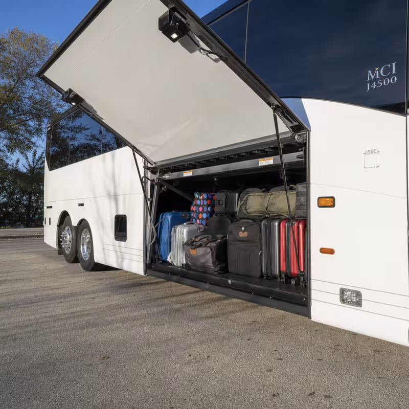 Party bus interior with wraparound leather seating and LED lighting in Plano