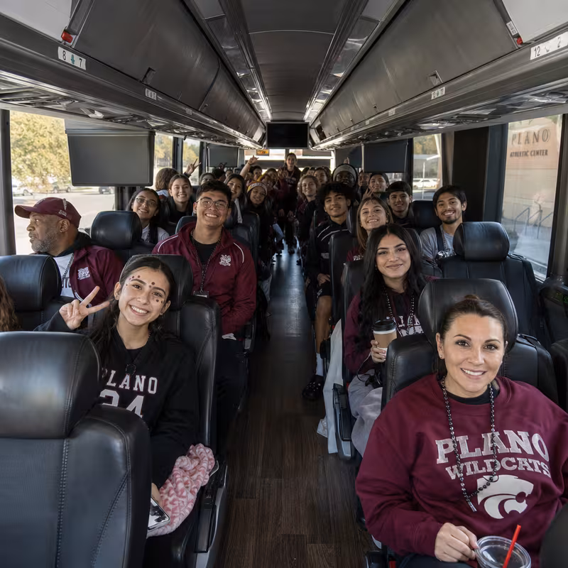 Black Mercedes Sprinter van staged for an Plano Sporting Event Transportation group