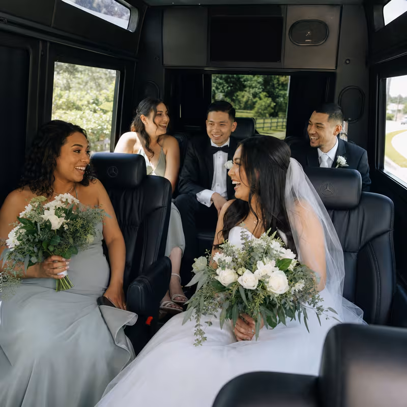 Black Mercedes Sprinter van staged for an Plano Wedding Transportation group